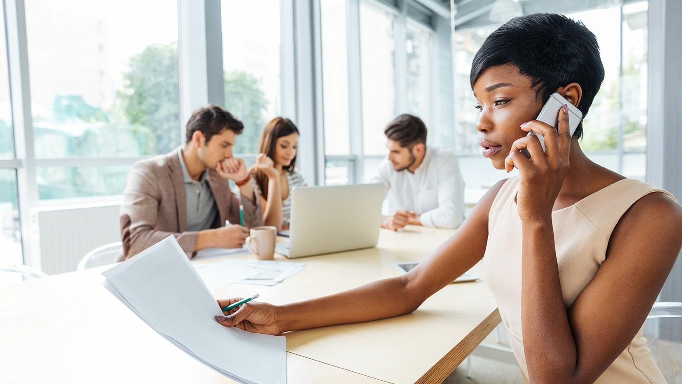 demo-attachment-133-serious-businesswoman-with-documents-talking-on-P9Q6LX6